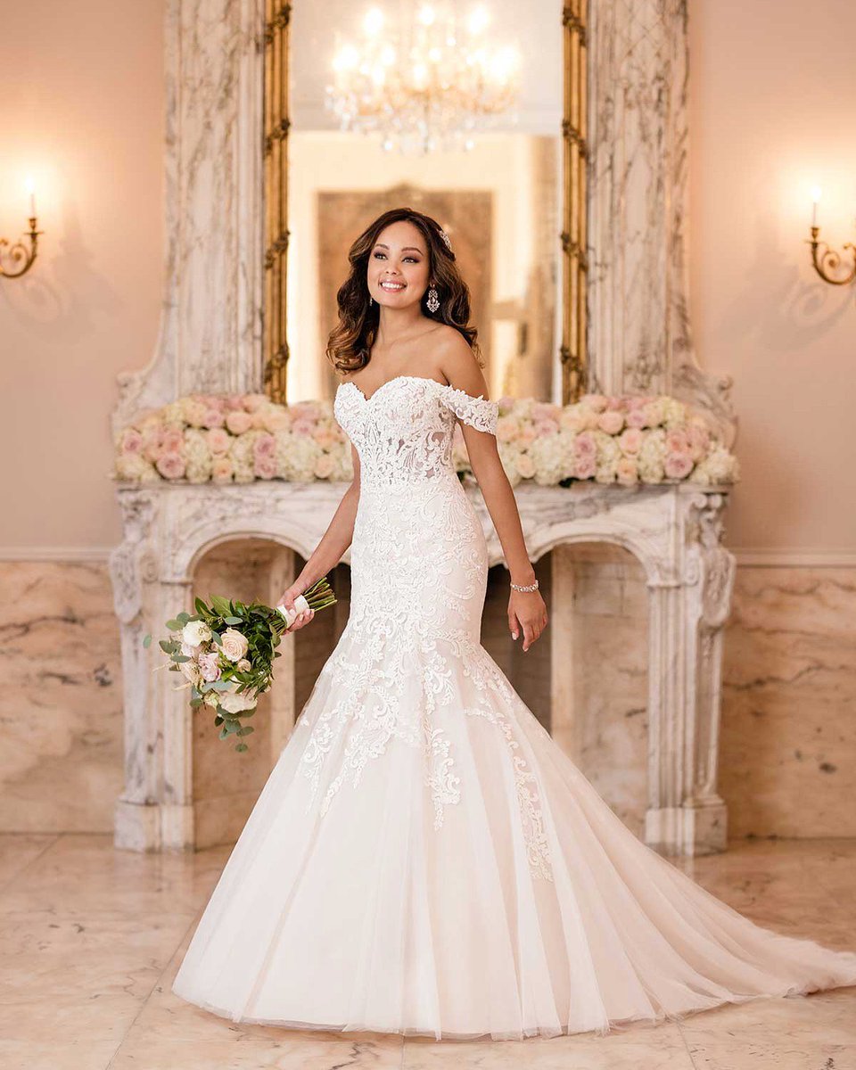 A new Stella York Fit and Flair Gown! Detachable off-the-shoulder sleeves meet a traditional sweetheart neckline with sexy sheer panels and exposed boning, reminiscent of corset styles. Soft shimmer throughout creates movement.  #SayYesToWonderland #WonderlandBridal