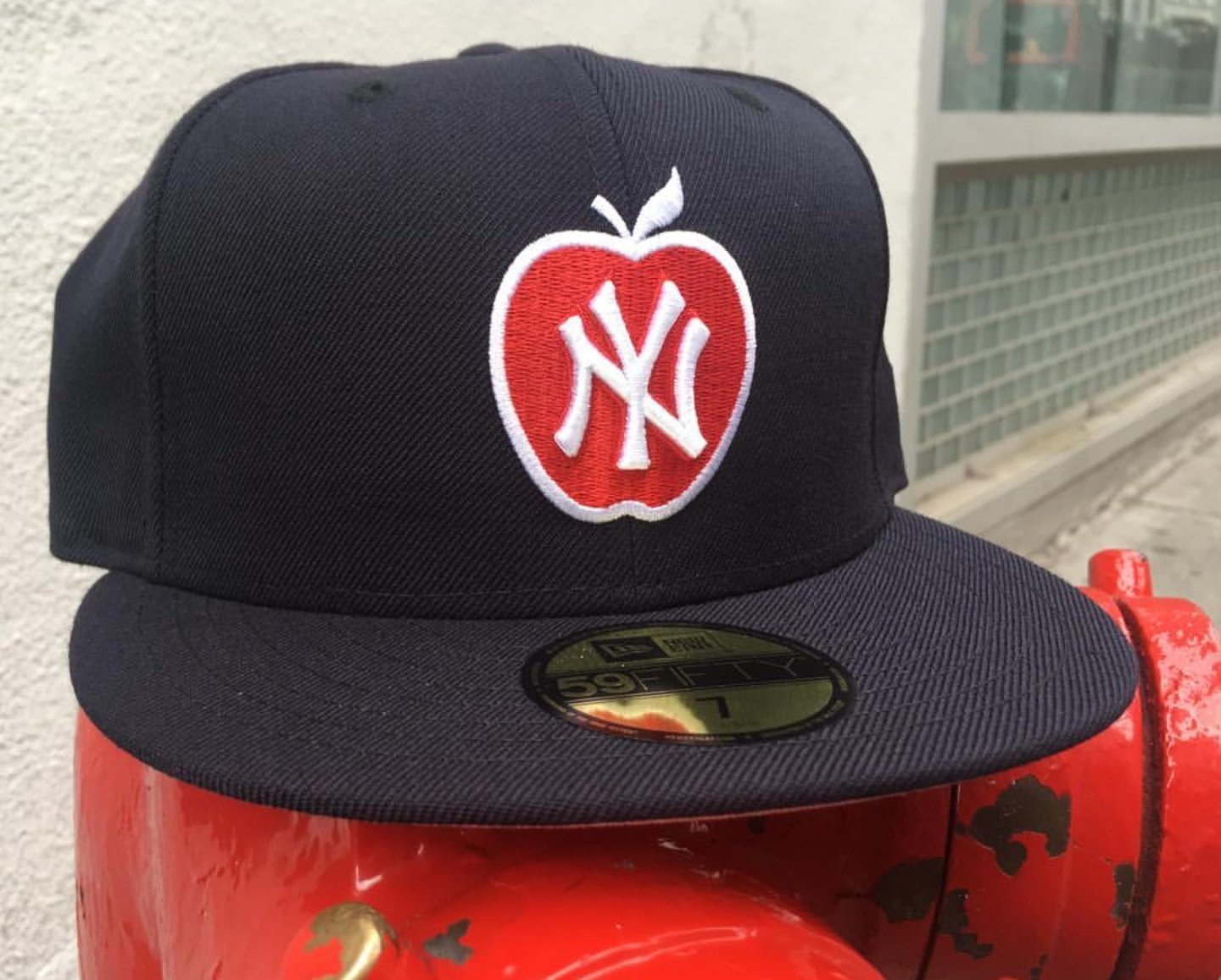 HAT CLUB X A modern NYC classic the New York Yankees Apple logo hat is back on the shelves. Scoop one up today. before we have to remake them again which