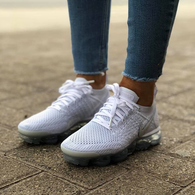 all white vapormax on feet