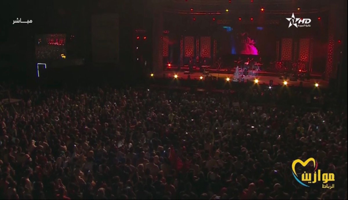 Myth201's tweet photo. Le public marocain, comme d'habitude, dictée le concert et Nancy Ajram publie amour, joie et enthousiasme dans son public marocain #نانسي_عجرم_في_مهرجان_موازين  @NancyAjram 
#NancyAjramattheMawazine https://t.co/zrVHVYNZfq