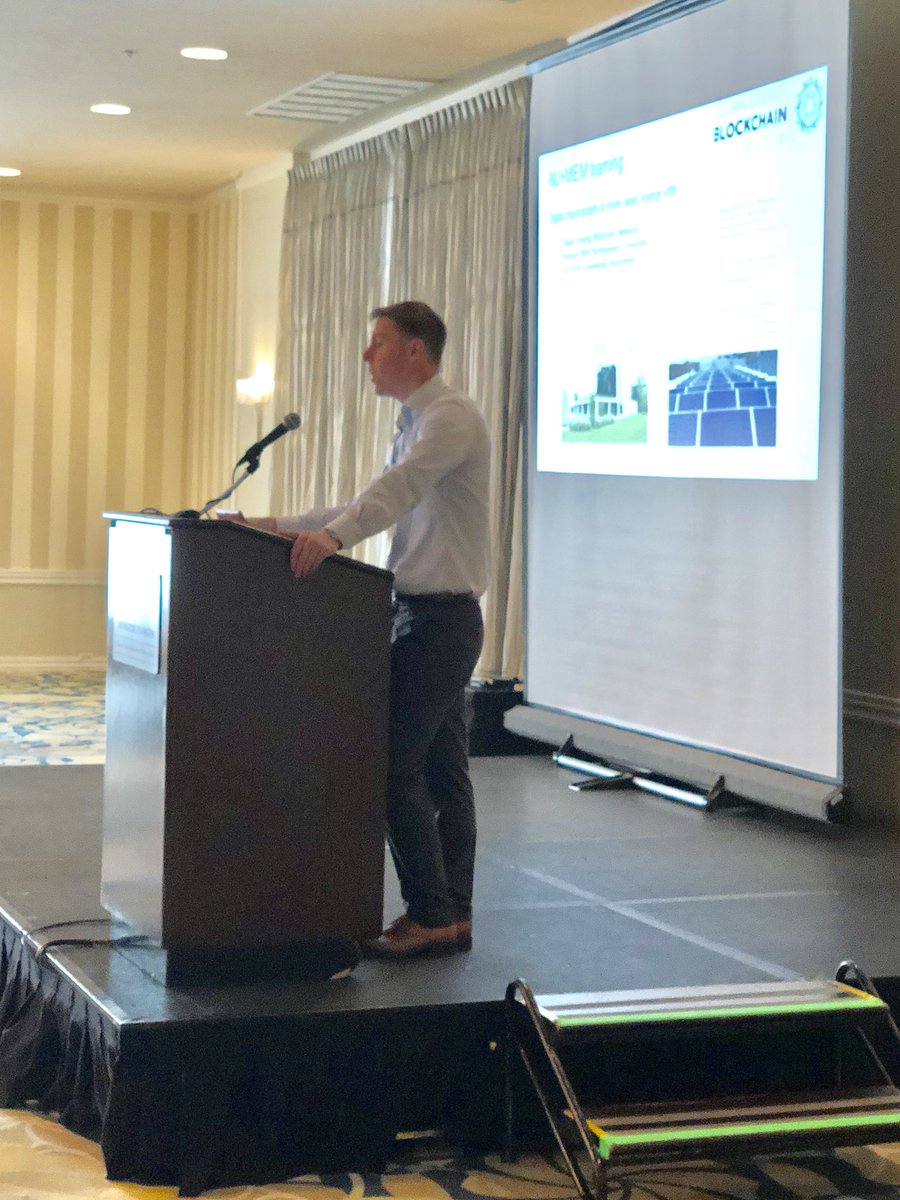BlockchainClean's tweet photo. #MikeAshley speaking about #CleanEnergyBlockchain at IEEE TESCOM18 https://t.co/AJgjr0Sdys