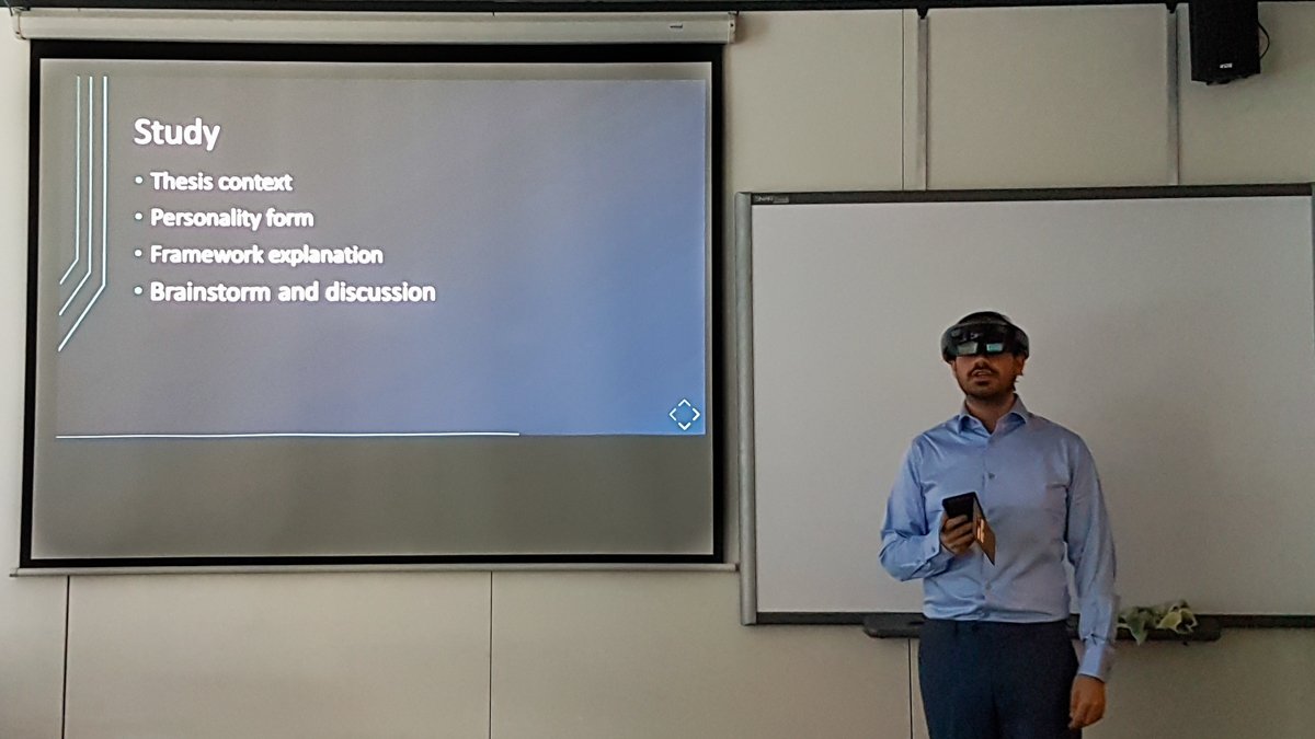 beatsigner's tweet photo. One of my students presenting their Master's thesis by using the augmented reality interface for their extensible presentation framework. Something to be added to our MindXpres presentation platform https://t.co/AOk7wGxl5G @VUBrussel @VUB_WISE #HoloLens #HCI #mixedreality #AR https://t.co/432bHq3hC7