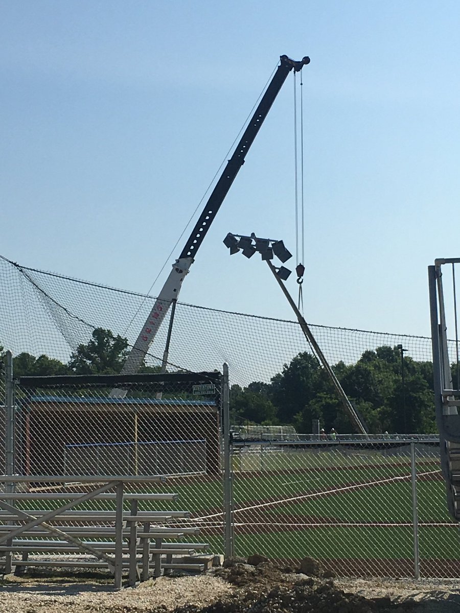lights going up at Fitch high school baseball field today .