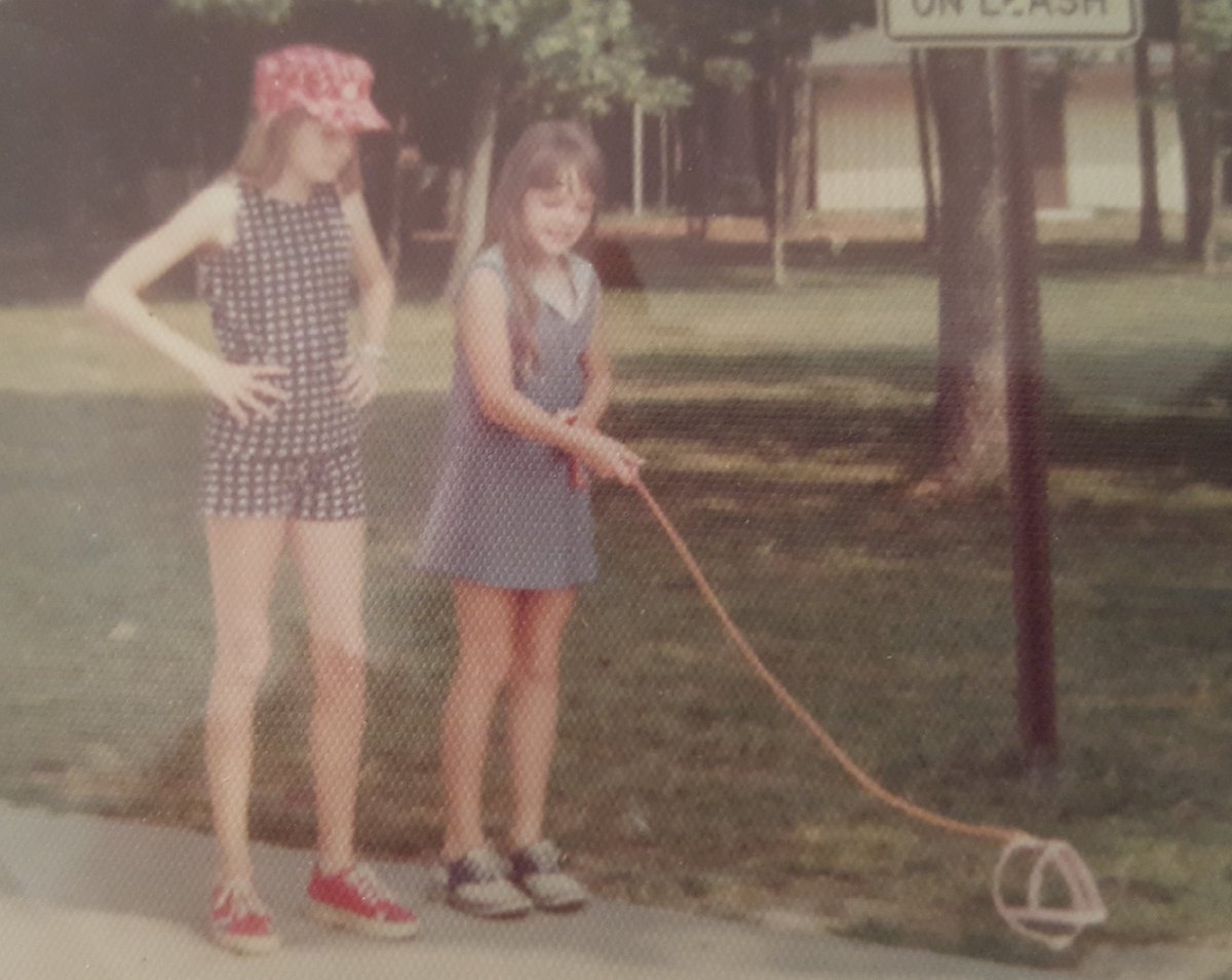 I love this pic of me and my sister walking our imaginary dog! #classic70s