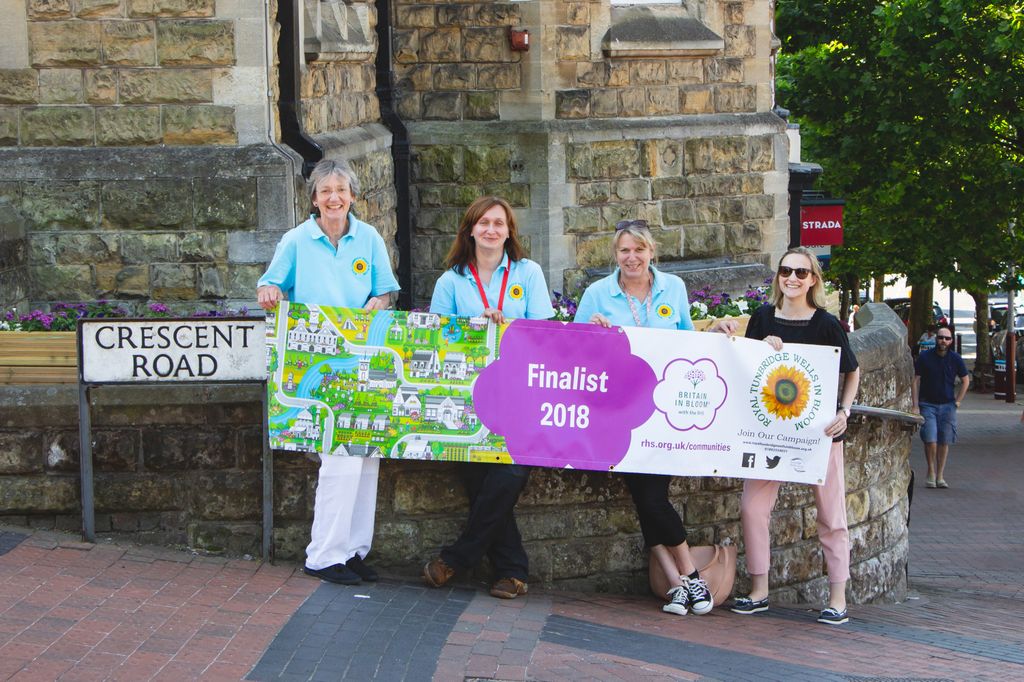 TWellsCouncil's tweet photo. Colleagues in the parks team were working hard with In Bloom yesterday and replanted beds outside Lloyds Bank in Royal Tunbridge Wells.
The Vote 100 planters (purple, green and white) planted by Soroptimists and residents of the Chamberlain Court Care Home and sponsored by Lloyds https://t.co/TxTKfYznmp