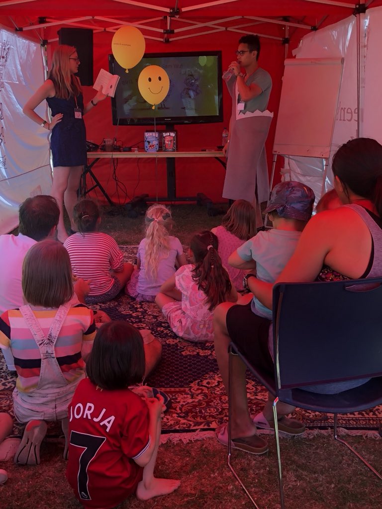 ClaireMShanahan's tweet photo. At the @QPBookfest and @kwebberwrites @kevtsang are entertaining the crowd with #samwuisnotafraid. There’s about to be some audience participation too: afraid of penguins?! #qpbookfest https://t.co/9bOPk63gKO