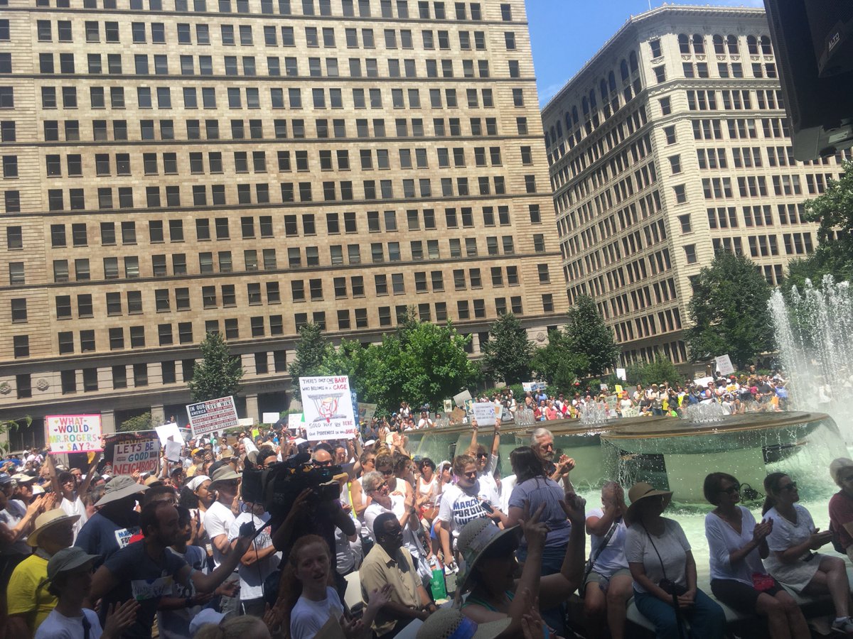 arya_sundaram's tweet photo. Downtown Pittsburgh’s Mellon Square was packed with more than a thousand people today for the Families Belong Together rally @FBT_PGH @familiesbelong https://t.co/8N1SstwXi7