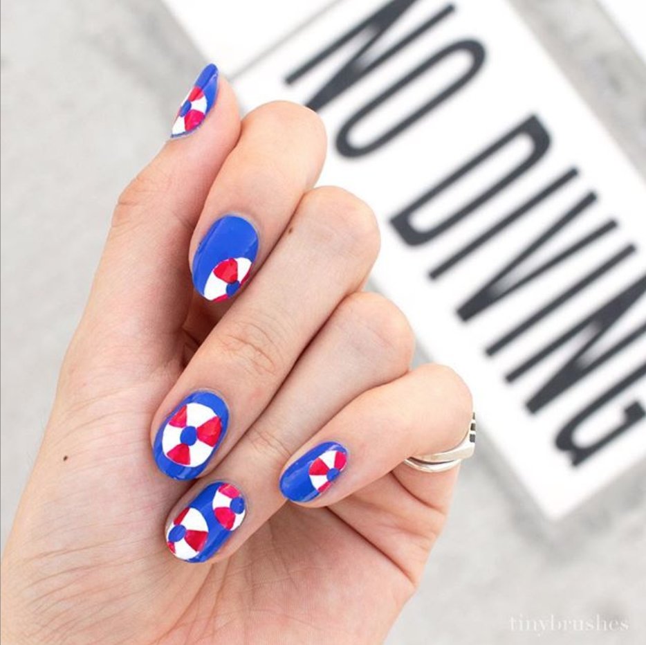 essie's tweet photo. this summery nail art from @tinybrushes has us so ready for the fourth! shades used: #butlerplease, #reallyred, and #blanc https://t.co/4CDlfFyeen
