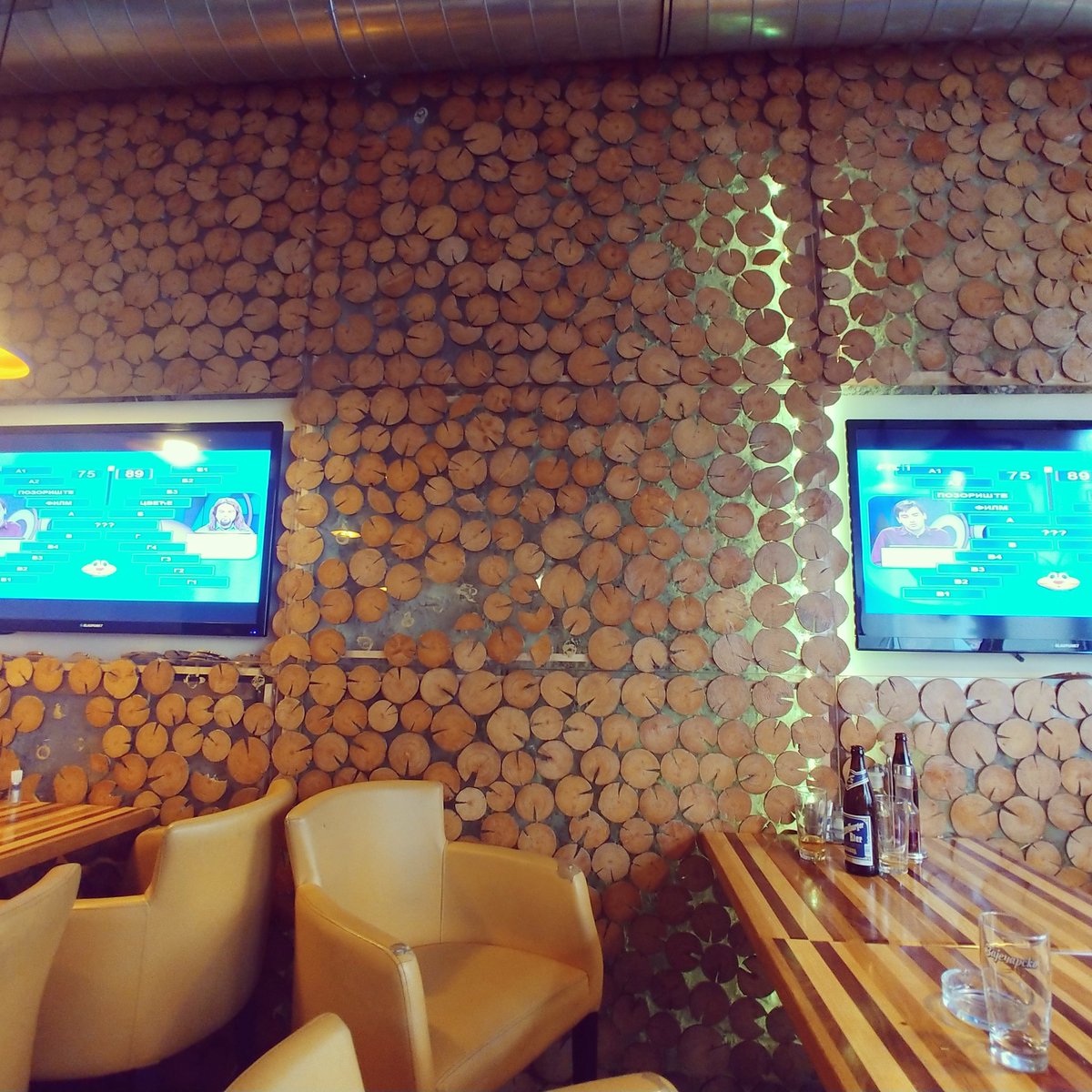 A #serbian restaurant wall in #vienna #austria . Tree cookies fixed to acrylic backlit by leds. Great food too! #doitwise
#moderndesign 
#moderndesignfurniture 
#customwoodworking 
#customcreatioms
#woodworking  #wood #woodshop #craftsman #powertools #makers #makersmovement