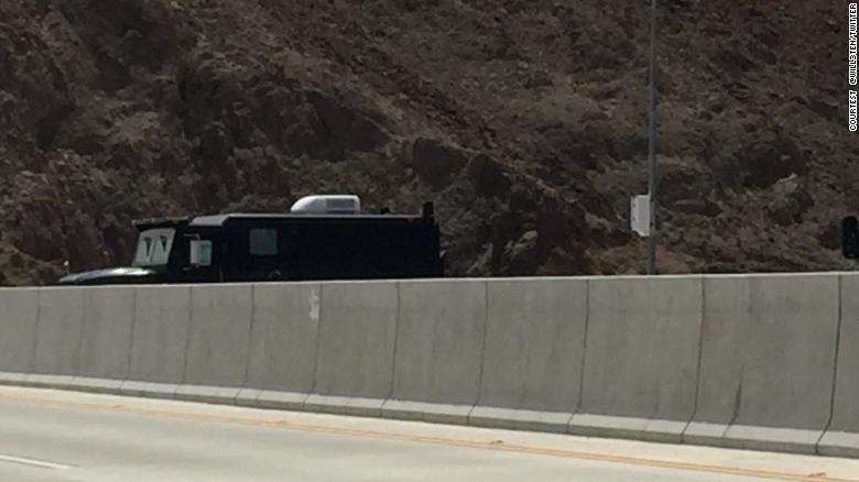 An armed man  blocked a highway near the Hoover Dam with an armored truck on Friday and demanded the release of the Justice Department's internal report on the Hillary Clinton email probe, which had already been released. cnn.com/2018/06/15/us/…