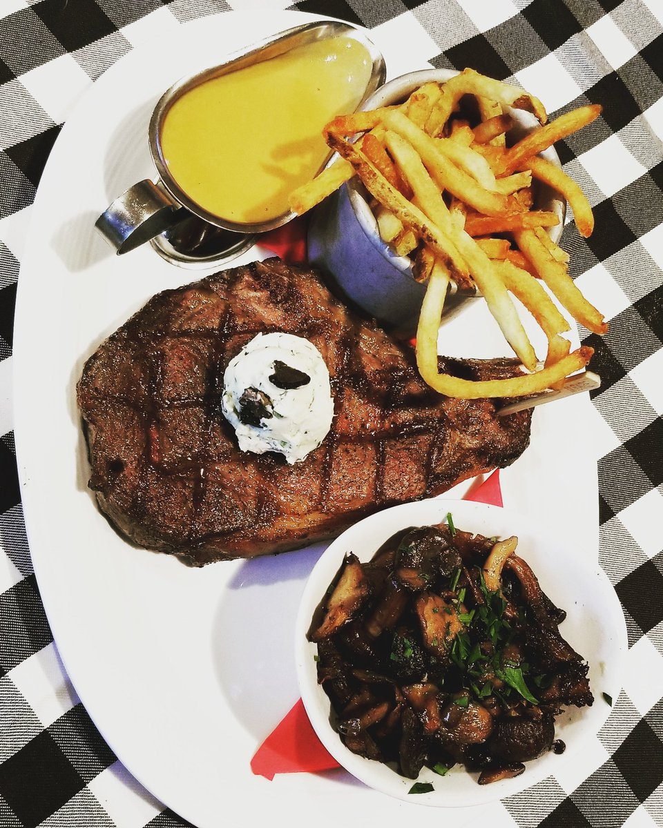 Father's Day dinner with Julia: Grilled ribeye with truffle butter, demiglace cream, roasted mushrooms and our hand cut fries.