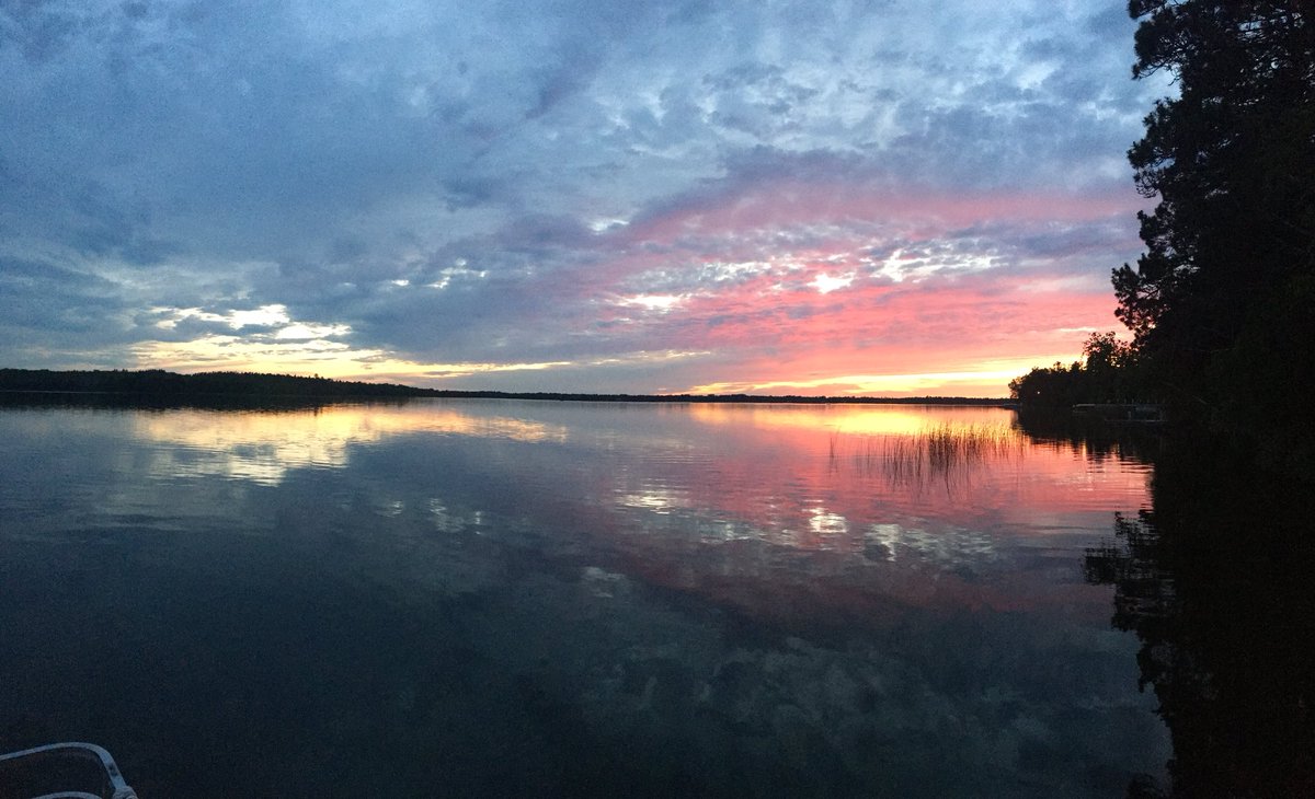 Fremont_Tennis's tweet photo. While the weather back home hasn’t looked good, up north we were able to get in a hit after fishing today and before a gorgeous sunset! #summerisgood https://t.co/7GSyNOmQ5e