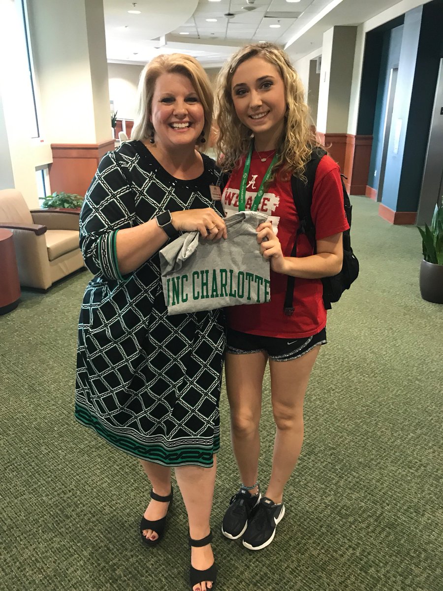 CLTDean's tweet photo. Listen #UNCC22! We are serious about reppin’ #NinerNation and i will call you out! Replacing those “other” schools with Niner Pride shirts at SOAR! Excited to have Taylor in Niner Nation! #YouAreANinerNow #RepYourSchool #NinerPride #ProudDean #ProudNiner @unccnsfs @unccharlotte https://t.co/p2Qbfxf1WX