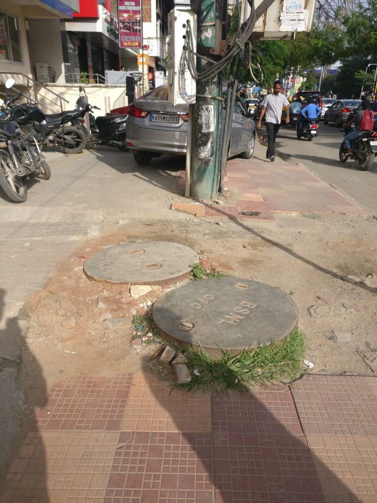 ralpharakal's tweet photo. Days and months since this car is parked on the pavement on a daily basis. Location: Koramangala 80 ft road, 100 m ahead of BMTC Complex. PS: No action taken even after repeated posts. @adugoditraffic1 @blrcitytraffic @AddlCPTraffic @ACP_TrafficEast @btppubliceye https://t.co/FJcbOJxsHC
