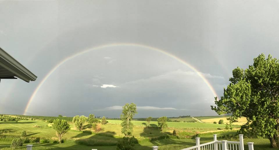 RileyOConnorwx's tweet photo. TUESDAY VIEW: Sweet pic of the rainbow just south of Stuart, IA. this morning. #iawx P/C Jodi Bassett https://t.co/WSLiFRaLS0