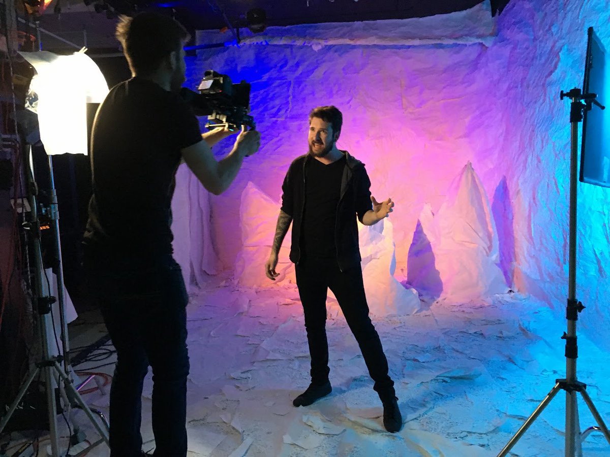 Singing in front of stalagmites?  Sometimes for a music video you need to build a weird mountain chain out of paper. Or something. Scope “Red Light” wherever you scope stuff.