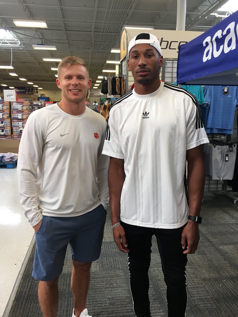 ShannonOnSports's tweet photo. Former @ClemsonFB Tigers @adamhumphries13 and Charone Peake teaming up with Boys &amp; Girls Club taking kids shopping @Academy Per kids: both players give great fashion advice on shoes 👟👍 @foxcarolinanews https://t.co/xlbxuJcpqw