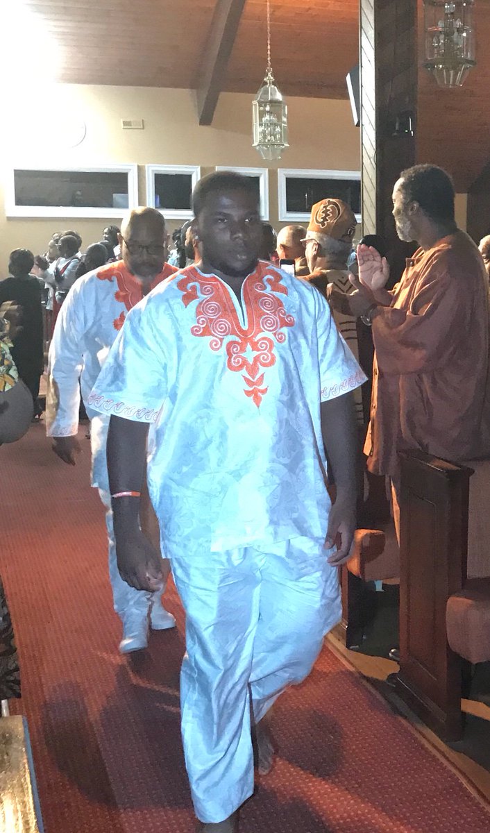 CBYoungMen's tweet photo. Elijah Moore escorted by his Dad Ray Moore as he steps up to be anointed and receive his new name Carib Bakari #cbdad #ritesofpassageceremony #cb12 #cbforlife #thevillage https://t.co/sPjq8nurtD