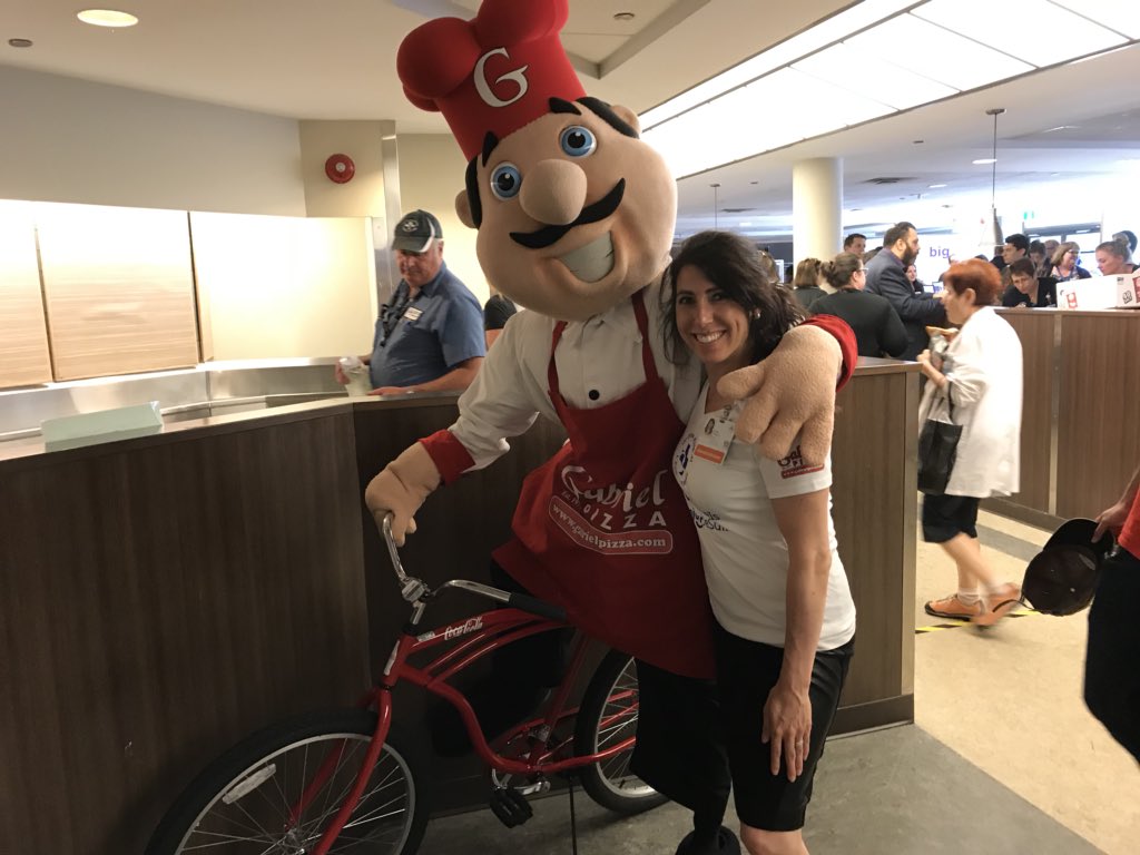 OttawaHospital's tweet photo. Chef Gabe tried to get away with one of our raffle prizes! 

Fortunately for us, he struggles with operating bicycles. 

#TOHSAW #StaffAppreciationWeek #GabrielPizza #ChefGabe https://t.co/f7GMOF7o2H