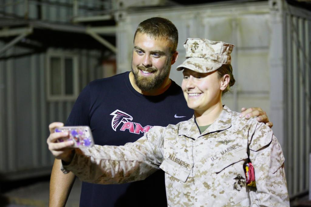 The_USO's tweet image. Selfie or it didn't happen. @BenGarland63 is currently on his 2nd USO tour this year! The @AtlantaFalcons offensive lineman, who currently serves in the Colorado Air National Guard, went on a USO tour with other @NFL players to Europe in May. #SaluteToService