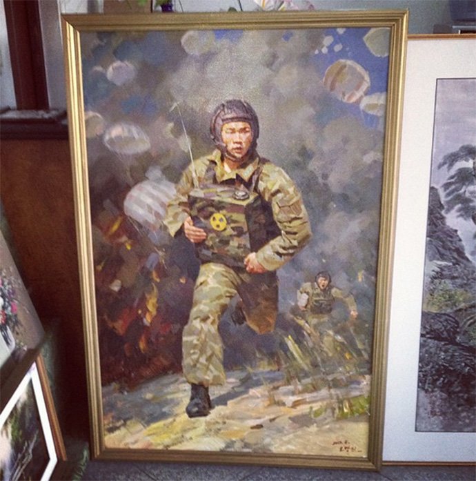 Another one in the series: Jon McNaughton painting on one side, North Korean state "art" on the other.  https://www.nknews.org/2013/10/north-koreas-nuclear-backpacks-appear-on-850-oil-paintings/