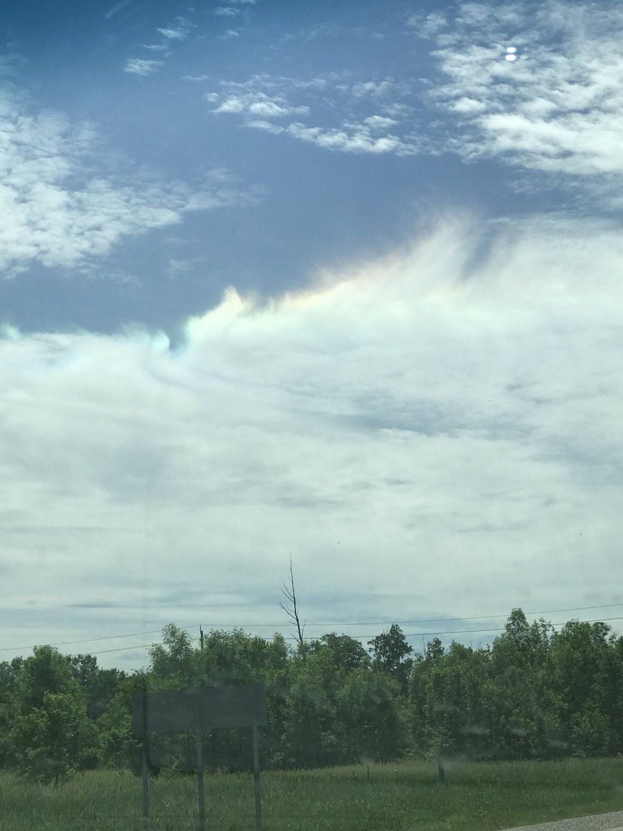 ATaleOf9Lives's tweet photo. Rainbow in a cloud on a sunny day? This definitely wasn’t a sun dog. Any ideas @weathernetwork ? https://t.co/0ogLAvdnMZ