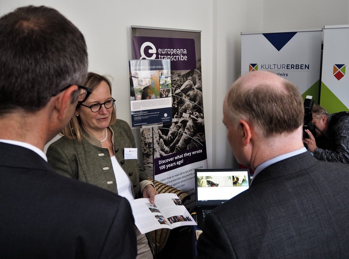 FFHistorians's tweet photo. Gerry Woop Berlin Staatssekretär für Europa @SenKultEu besucht den Stand der @kulturerben_sh und wird von Barbara v. Campe über deren Projekte und von Frank Drauschke über @Europeana1914 @transcribathon informiert. #sharingheritage @Europeanaeu #EuropeanHeritageSummit https://t.co/lXIimA9jpR