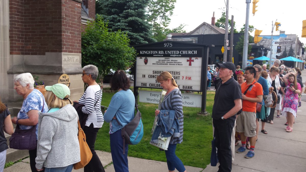 BookBankCanada's tweet photo. There is a line-up around the block for tonight's @ShoutSister1 concert. We are so thrilled to be here, to talk about the Book Bank and enjoy the music. #singout #readmorebooks https://t.co/aASlyVHBBQ