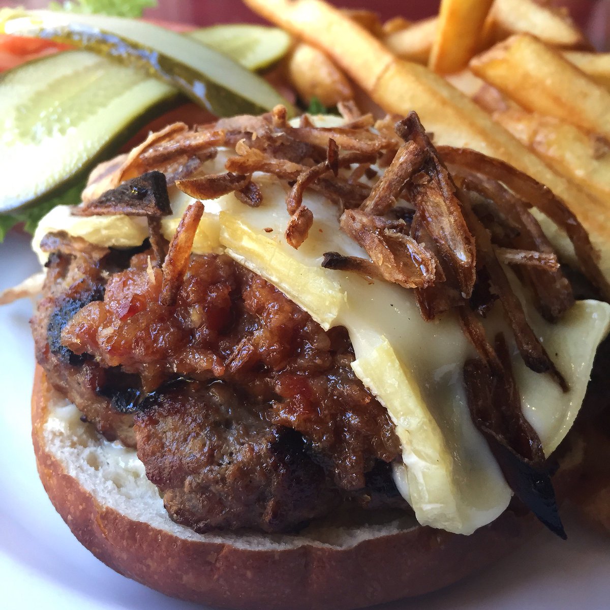 SPICY BACON CHEESE BURGER // Habanero &amp; bacon jam, char-grilled beef patty, melted Brie, crispy fried shallots, dill pickle mayo. #yyjeats #yyjfood #yyj