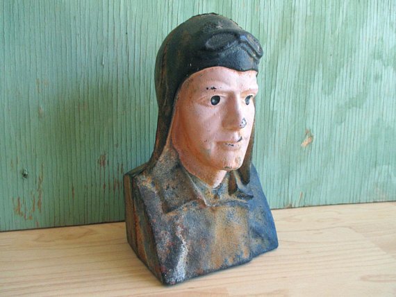 SquirrelAwayVtg's tweet photo. Vintage Lucky Lindy Cast Iron Bank, Charles Lindbergh Aviator Pilot Coin Bank https://t.co/OgUBDg01hG via @Etsy #vintagehome #etsyvintage #aviation #giftsforhim #stillbank https://t.co/8S6mLxyV3j