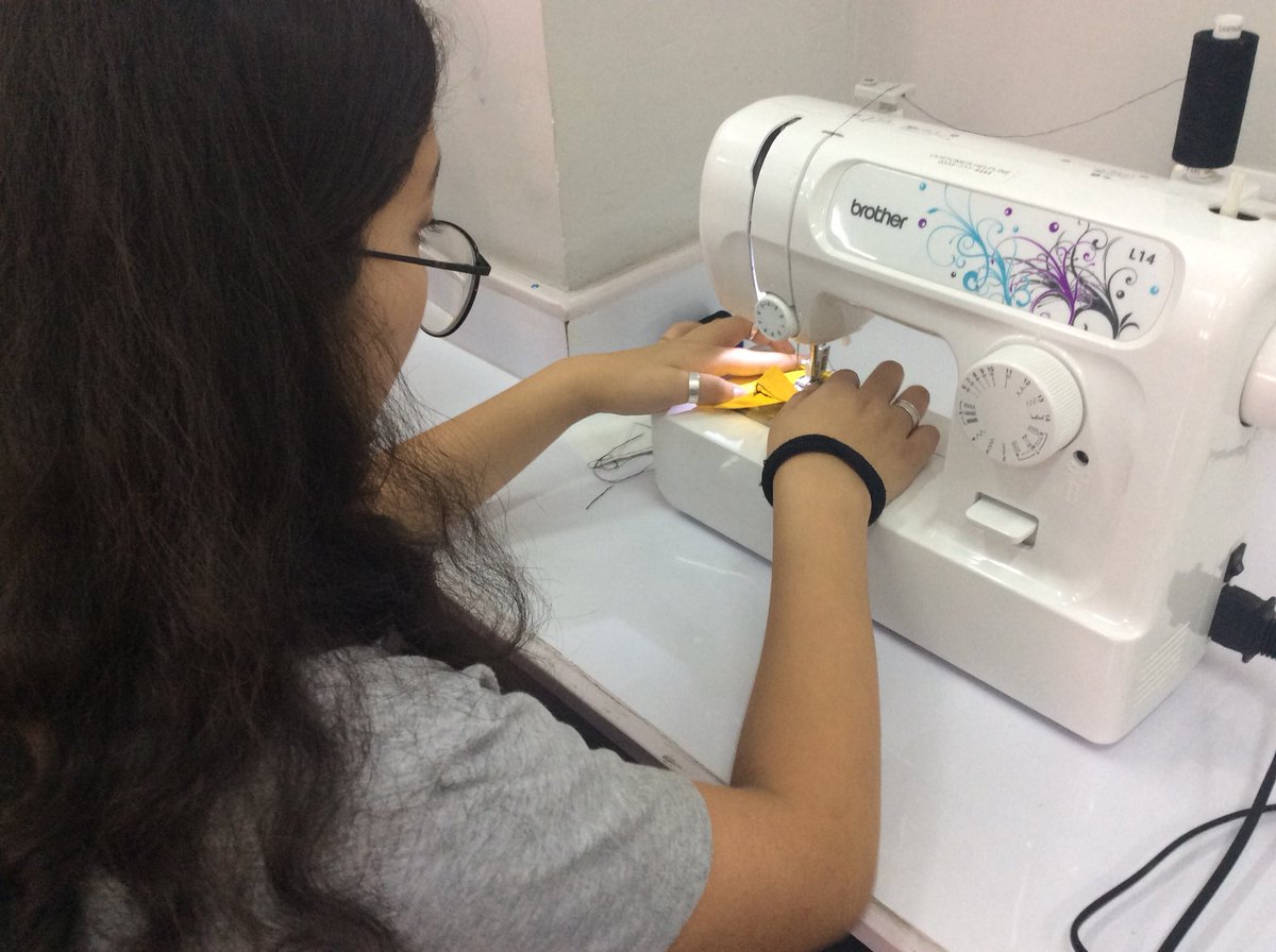 TBSdt's tweet photo. ICE week TBS Project runway - designing their garments and learning how to sew. #fashionistas #sustainablefashion https://t.co/De8UTYtMuf