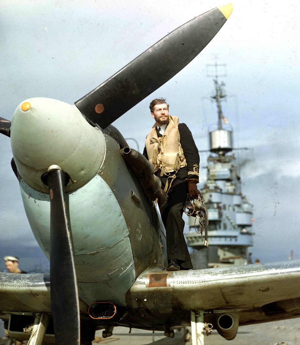 CcibChris's tweet photo. Wavy Navy
A Fleet Air Arm pilot on the wing of his Seafire on HMS Indomitable, 1943. https://t.co/GTw9HIH2HG