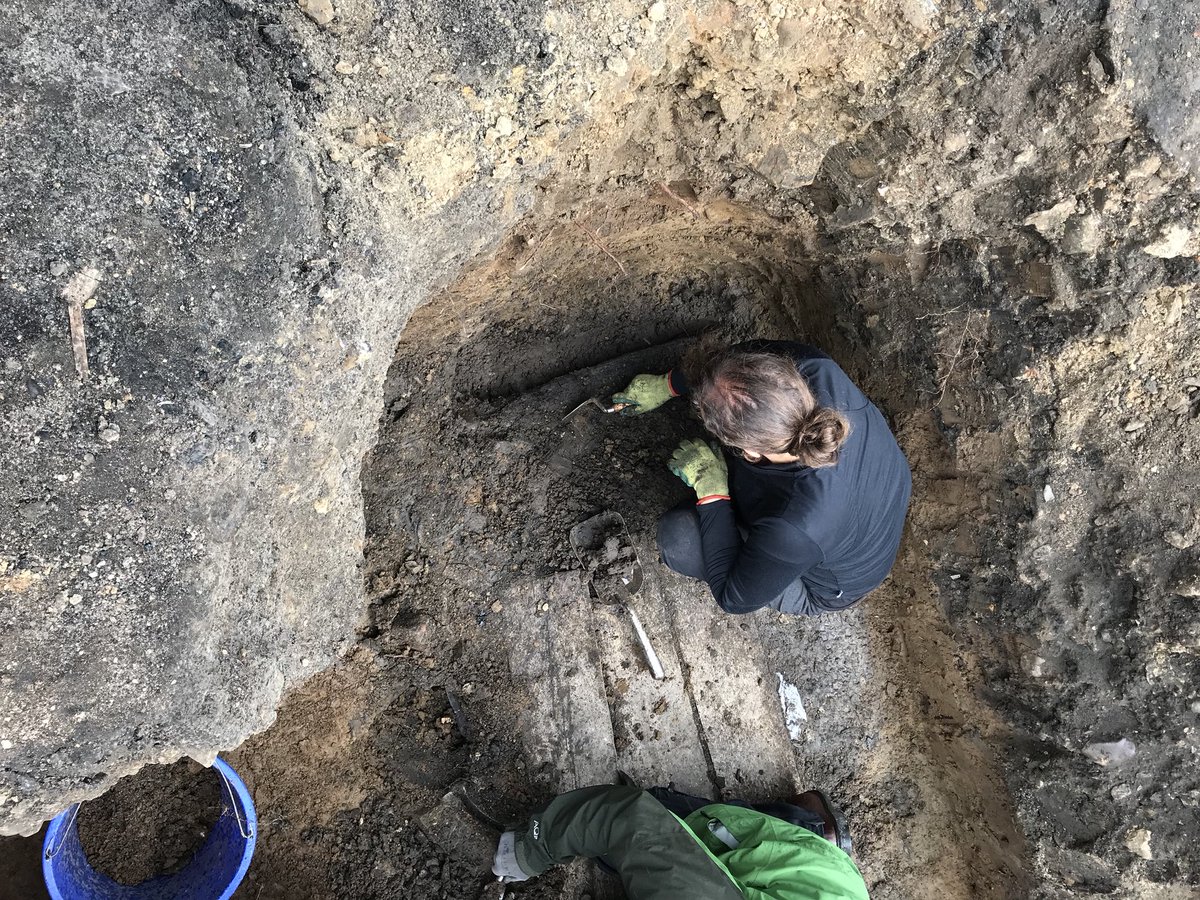DUACE2025's tweet photo. Have a look at our wonderful volunteer Megan excavating out more wood. @aucklandproject #durhamdigs @ArcDurham #DUACE https://t.co/0G1JpoiYlF