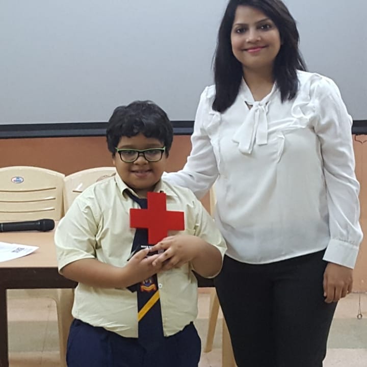Students of Maneckji Cooper Education Trust School receiving Red Cross trophy for their exemplary performance in Donation Card Drive. #donationcards #IRCSMumbai #youthparticipation