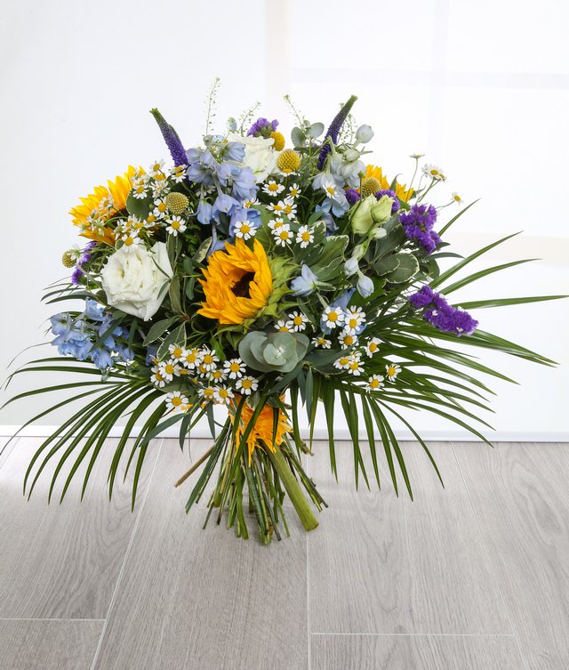 We’re still in the process of preparing our new website,in the meantime please browse this beauty from our catalogue.
Hermes designed to brighten that special persons day with exotic tones &amp;textures.This bright bouquet includes Sunflowers,Lisianthus,Thlaspi Bell,Limonium &amp;Palms