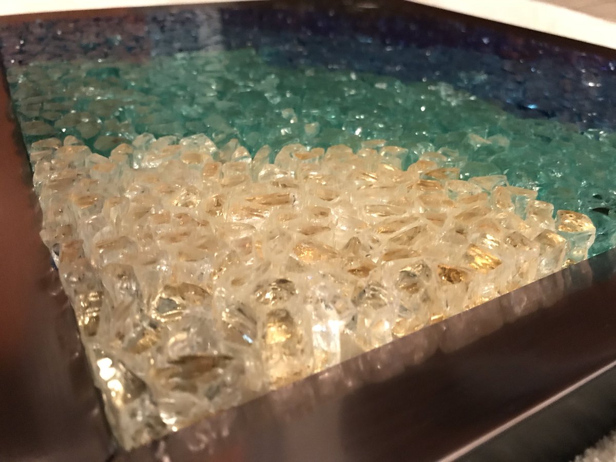 mmhohenstein's tweet photo. New art, “Daybreak”. Broken, tumbled glass. 14x16. Will be showing at “Half Full” exhibit on July 7 from 5:30-8:00 pm. at Lost Pines Art Center #Bastrop #UniqueMedium #Glassworks #art #LocalArt https://t.co/jVeNU9wfGX