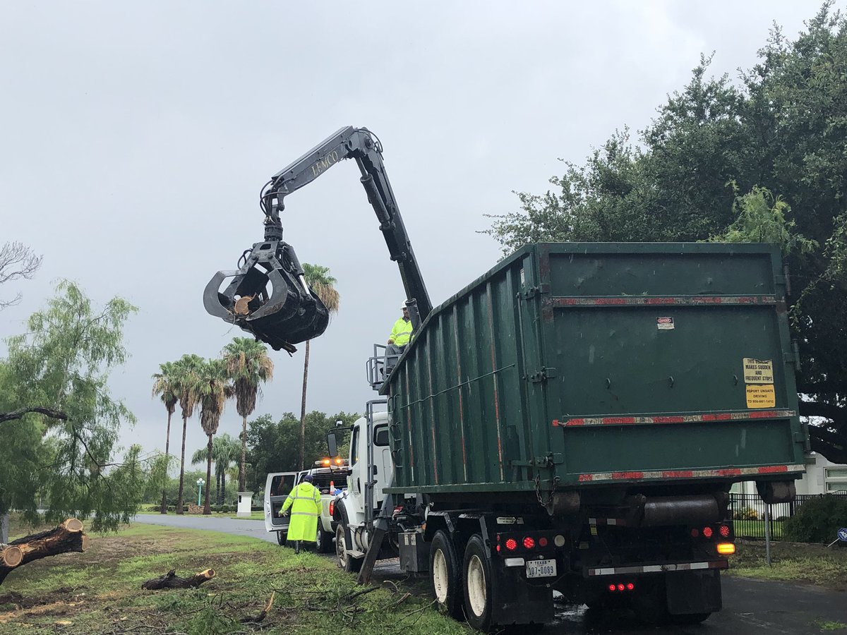 CityofMcAllen's tweet photo. McAllen Public Works crews are out clearing downed trees. Please report any downed trees on roadways to McAllen 311 at 681.3111. https://t.co/hx4Y7uExkO