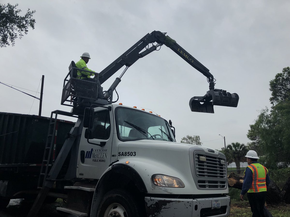 CityofMcAllen's tweet photo. McAllen Public Works crews are out clearing downed trees. Please report any downed trees on roadways to McAllen 311 at 681.3111. https://t.co/hx4Y7uExkO