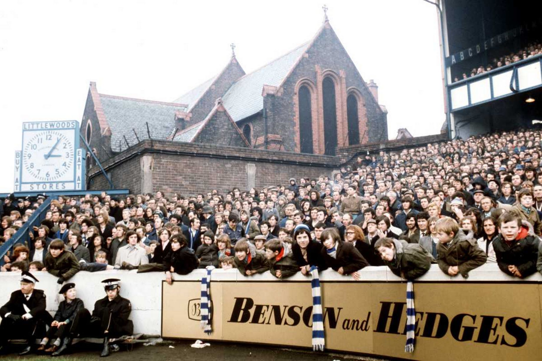 Kathleen on X: "1971 Goodison Park, St Luke's Church overlooking Everton  fans in the Gwladys Street End -this photo shows more including the clock.  https://t.co/UfLEcduyih" / X