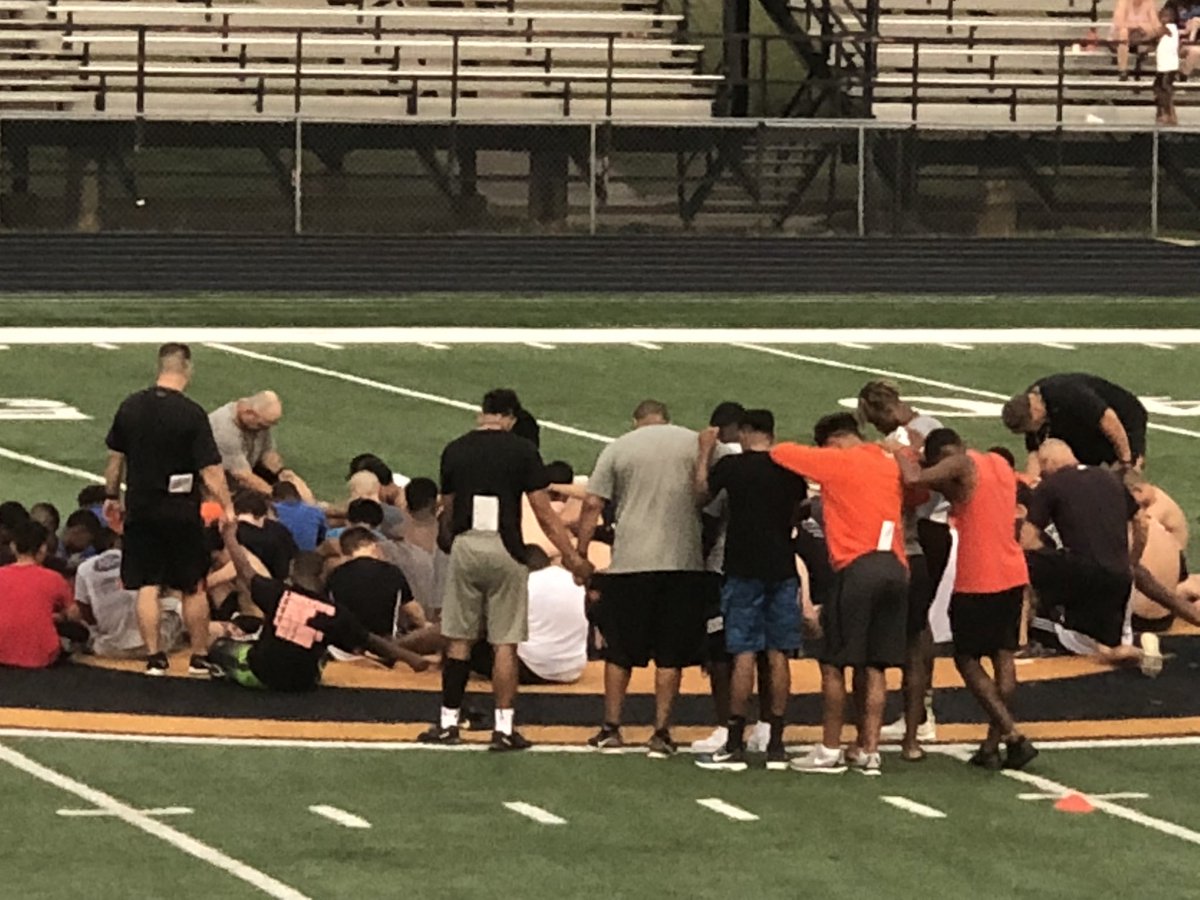 jbbowman7's tweet photo. This what makes the Gilmer Buckeye coaching staff special. Talking to kids at football camp about #Christ and praying with the kids, coaches and former players. Buckeyes have a bigger purpose than #football. This is why I have had 3 boys go thru this program. #thsfb @THSCAcoaches https://t.co/BD5GVdtAs0