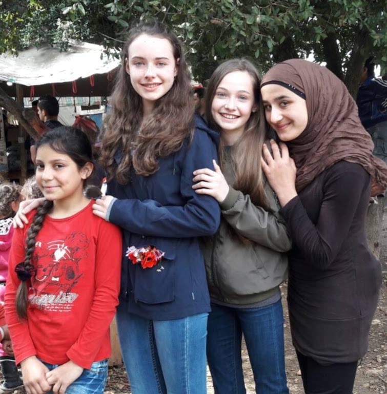 ChildofNature_'s tweet photo. We stand with refugees! These amazing young women have been working together to teach children and spread their message of peace. We honor the courage of displaced youth. This is just the beginning! 
@11WIEDU #WorldRefugeeDay #TheChildrensRevolutionHasBegun #ChildOfNature https://t.co/T3jQvjxb28