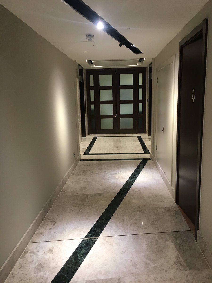 QuadContracts's tweet photo. Project coming to a close in EC4. The design intent to line up the black light channels with the black tiles to the floor really gives a nice effect. Another job well done by the Quad team. #construction #fitout  #refurbishment #refurb https://t.co/LIAQxxhqES