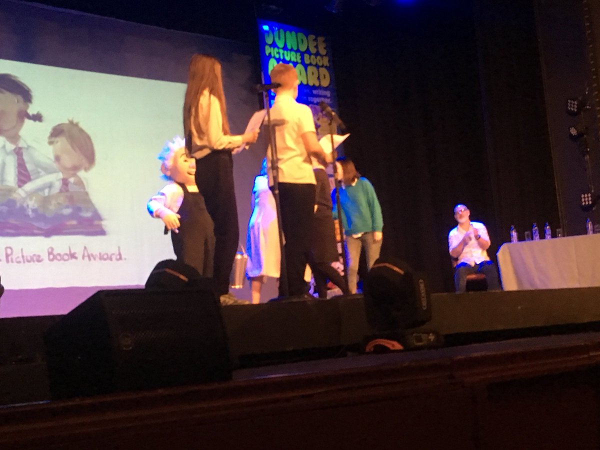 gail29s's tweet photo. Well done @RosebankPS for excellent compering at the Dundee Picture Book Awards in the Whitehall Theatre today. Fabulous books, School for Little Monsters by Michelle Robinson and Sarah Horne took Top prize.   Look out for art work in your local libraries.  #readingforpleasure https://t.co/5jL1tTgILU