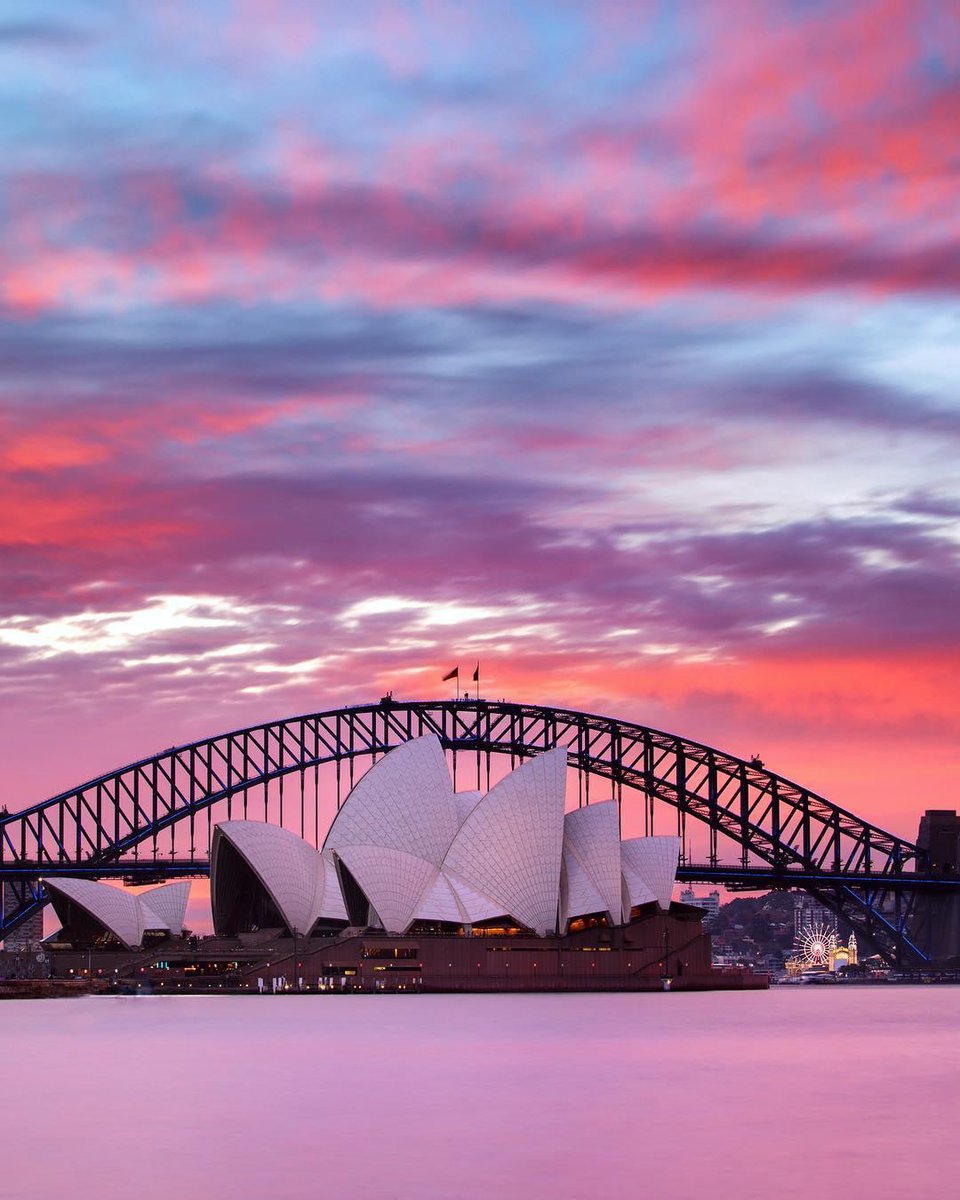 Australia's tweet image. 💗 #Sydney is looking pretty in pink during one of its classic fairy floss sunsets (via IG/elisaeves in @RBGSydney ) #seeaustralia