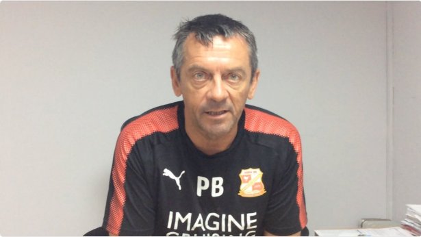 Are Swindon keeping Phil Brown against his will?
