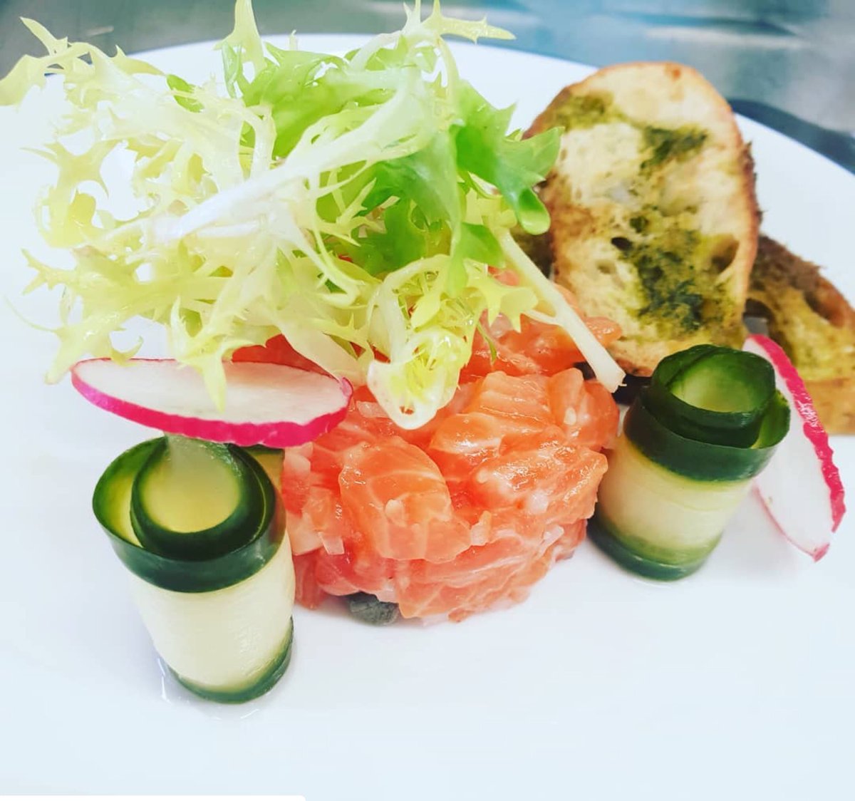 Sea trout tartar, pickled cucumber, radish and herb crisp breads. Tastes amazing - we don’t just do dish and chips........ #stmawes #thewatchhouse #cornwall #chefspecial