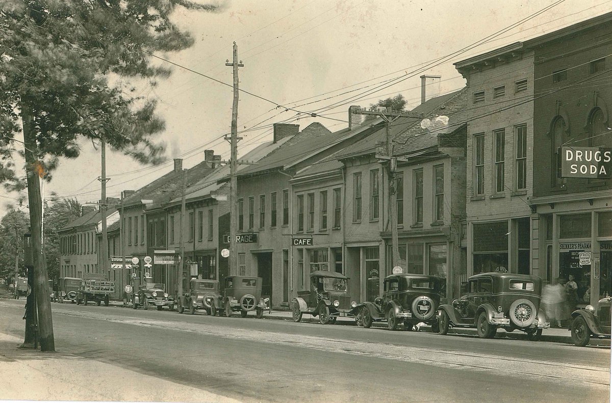 centervillelib's tweet photo. Throwback Thursday!
This early 1900's photo of Main Street is taken from Morton Ave looking East.

Today,  Ugly Mugs is located in the building with gas pumps in front. #TBT https://t.co/wgnAknd6ap