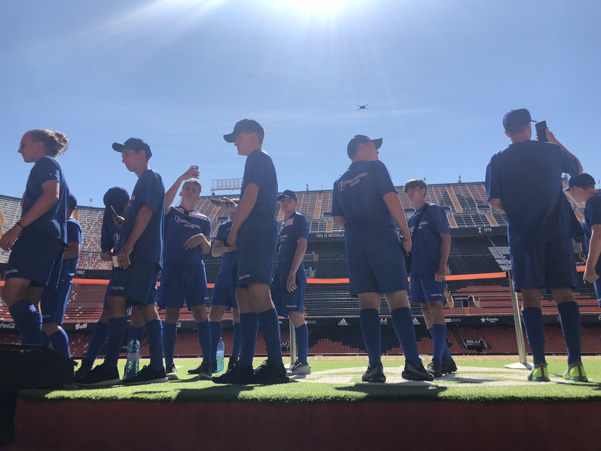 dcsoccer88's tweet photo. On the pitch @valenciacf_en #ValenciaFC Great moment to be in the Managers seat & meeting senior staff who came to meet @dcsoccer88 students as part of our #InternationalTrainingCamp #TeachingUs #FootballCulture #Spain #Inspirational LaLiga https://t.co/wi1VerJtZ0