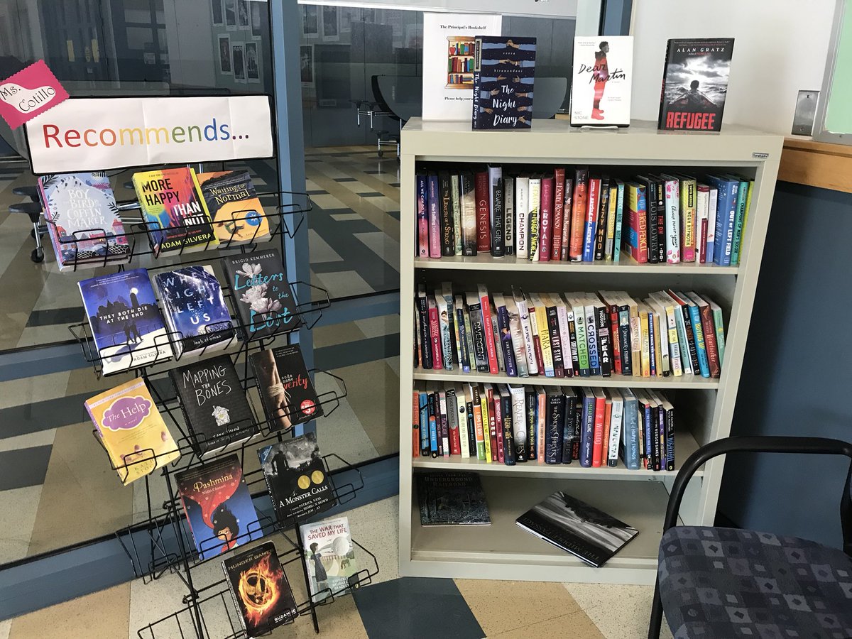 allincotillo's tweet photo. I’m declaring the first year of The Principal’s Bookshelf a success! According to the sign out sheet, 40 of my books were enjoyed by others this year...way more than if they’d languished in my office. Gonna try to double it next year! https://t.co/dVM5tZJQXB