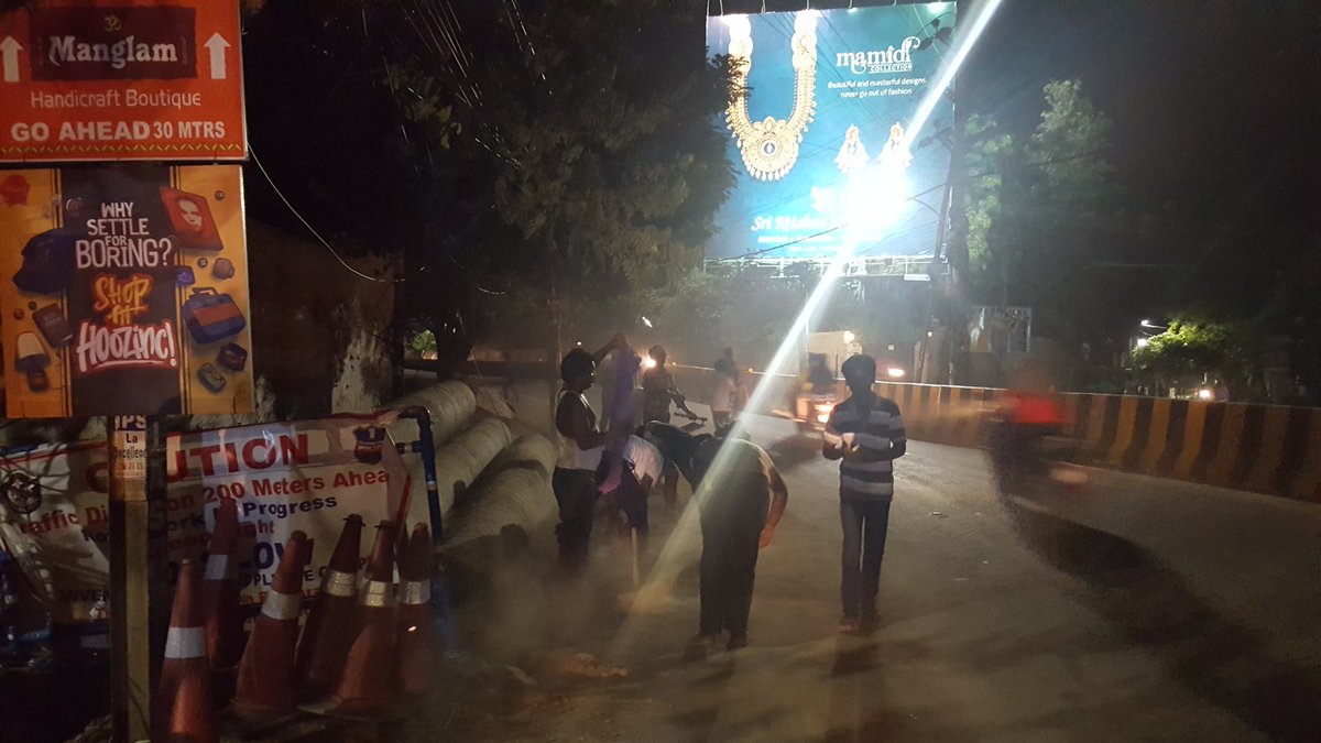 HMWSSB@onlinesir, Cleaning of CC  Road at NBT Kamman on 450mm diameter water supply main in Road number 12 Banjarahills-cgm2